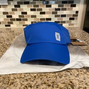 New with tags and packaging On Running hat.
